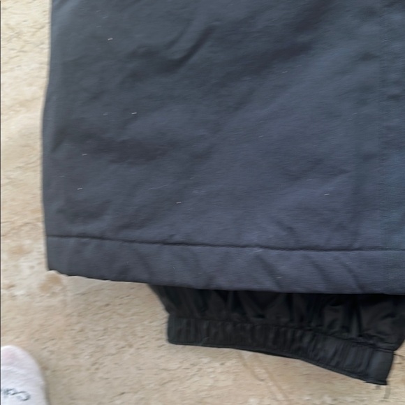 Black Wide Leg Snow Pants with Waterproof Material and Adjustable Cuffs - Picture 5 of 8